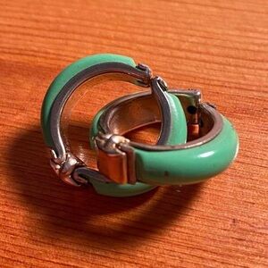 precious green clip on earrings